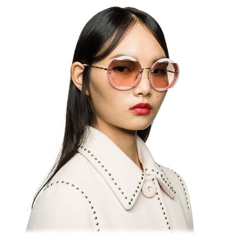 miu miu reveal glitter eyewear|Miu Miu Reveal glitter eyewear.